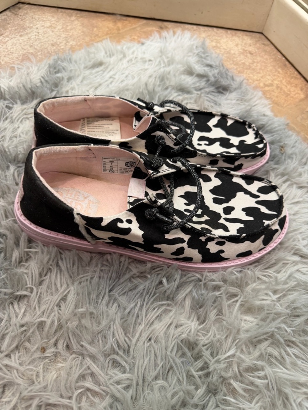 Hey Dude Women’s Glitter Cow-Print Shoes with Pink Sole